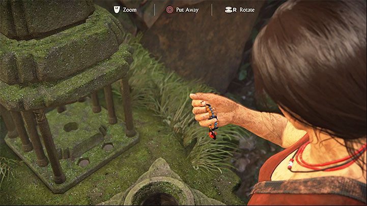 After finding all the tokens, go back to the same room and interact with the socle at the bottom of the map - this will transfer the tokens to the stone map - How to find the Queens Ruby (simpler treasure hunts)? | FAQ - FAQ - Frequently Asked Questions - Uncharted: The Lost Legacy Game Guide