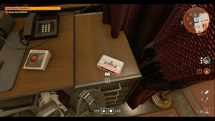 On a large wooden desk there is a small pink cassette - Secrets and collectibles in Brother 1 | Wolfenstein Youngblood - Collectibles and secrets - Wolfenstein Youngblood Guide